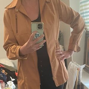 Peach toned raincoat/windbreaker